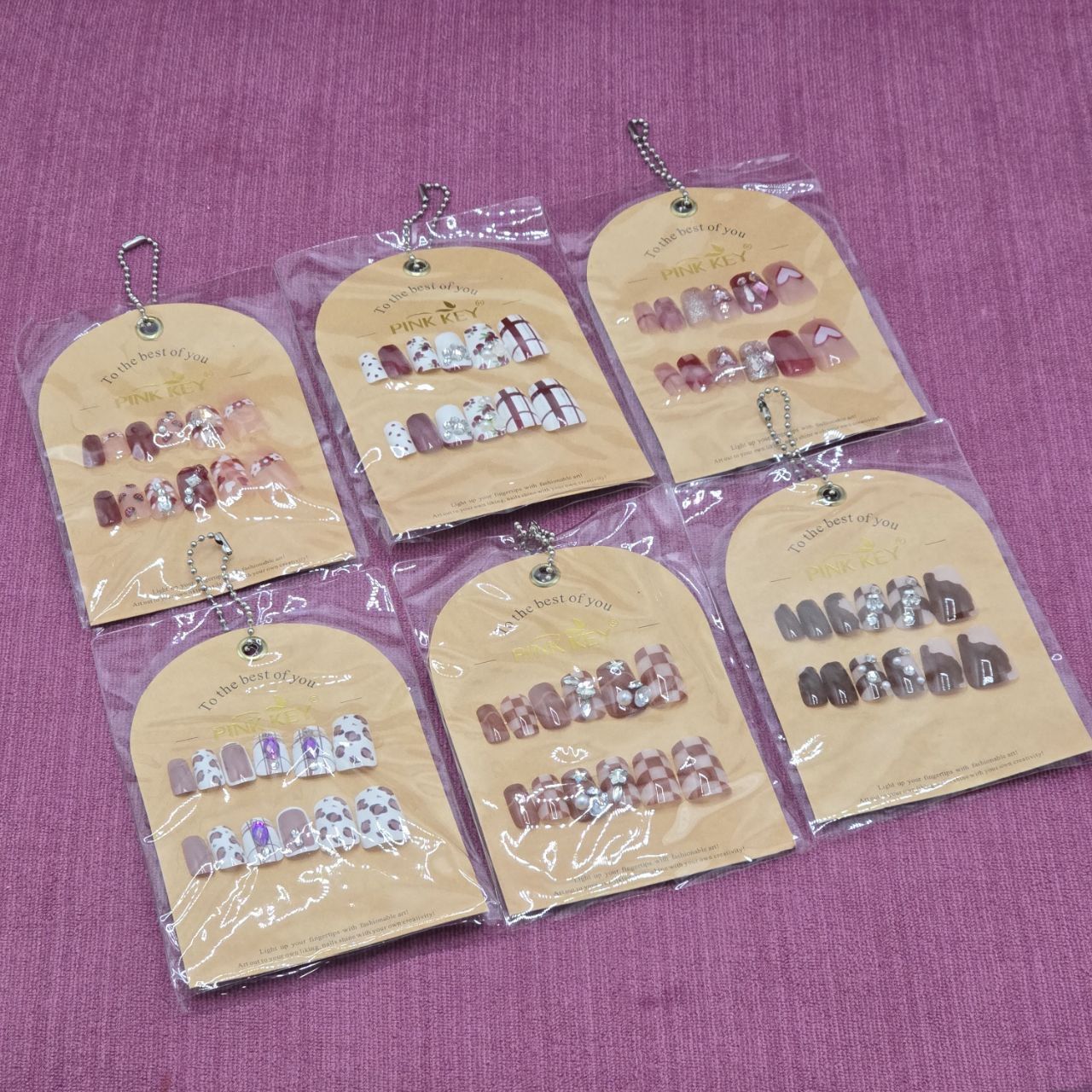 ناخن مصنوعی نگین دار و ژله ای و نشکن و بادوام برند پینک کی